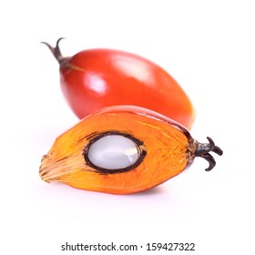 Cut fresh oil palm fruits on the white and clean background