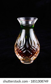 Cut Glass Vase On Black Background