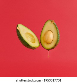 Cut In Half Avocado Dripping Oil