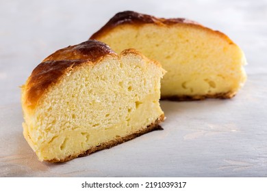 Cut In Half Of Fresh Homemade Romanian Cheese Pie On Table