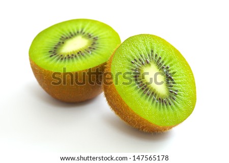 Cut kiwifruit on white background
