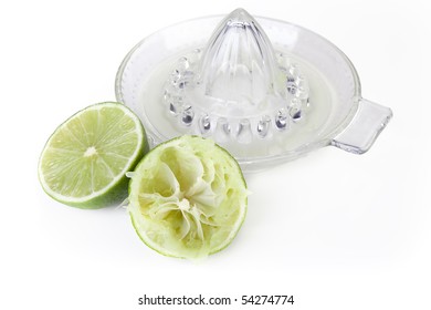 Cut lime with hand fruit juicer.