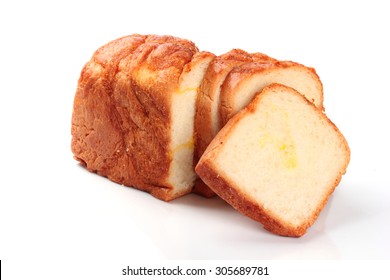 The cut loaf of bread with reflection isolated on white