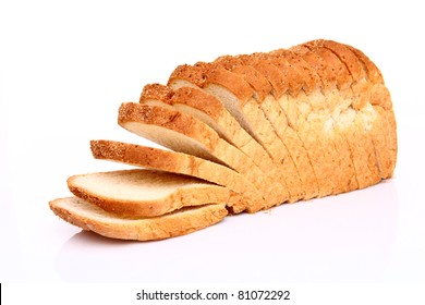 The cut loaf of bread with reflection isolated on white - Shutterstock ID 81072292