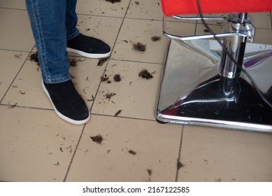 Cut Off Hair On The Floor In The Barber Shop . Master's Feet