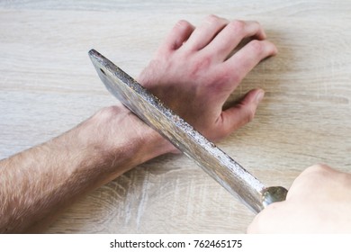 To Cut Off A Hand With An Ax