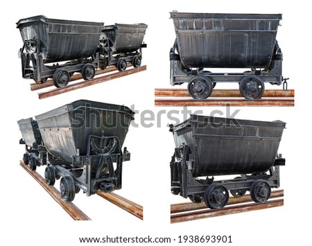 Cut out minecarts. Collection of old mine trolleys on rusty rails isolated on white background