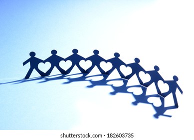 cut out paper figures shaping the heart in chain - Shutterstock ID 182603735