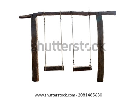 Cut out of two empty lonely hanging vintage wooden swings isolated on white background. 
