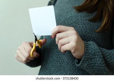 Cut paper with scissors