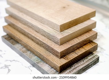 cut parts from chipboard for furniture production - Shutterstock ID 2109954860