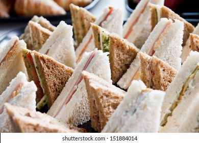 Cut platter of mixed  sandwich triangles