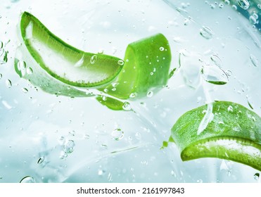 cut slices of aloe in transparent cosmetic aloe gel - Shutterstock ID 2161997843