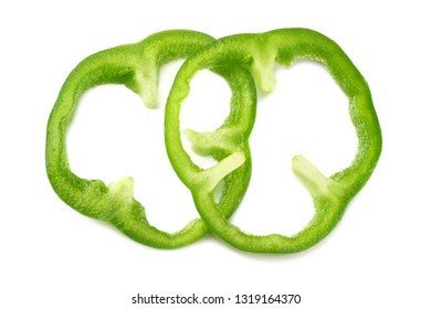 Cut Slices Of Green Sweet Bell Pepper Isolated On White Background Top View