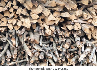 Cut wooden logs texture. Wooden background. Pieces of wood in the rural area. Pile of wood - Shutterstock ID 1124406362