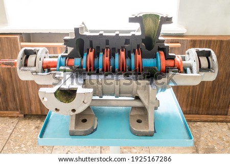 Cutaway retro engine mockup. Old pump for the mining industry. Stand for the study of electrical machines and engines.