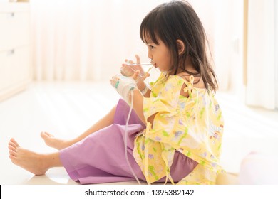 A Cute 3 Years Old Girl Is Drinking The Water In The Hospital Room When She Admit As In Patient With Diarrhea And Vomiting From Gastrointestinal Viral Infection