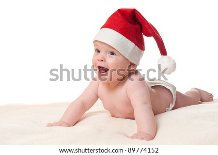 cute 6 month old baby boy in christmas hat lying isolated on white background - What To Get A 6 Month Old For Christmas cute 6 month old baby boy in christmas hat lying isolated on white background - What To Get A 6 Month Old For Christmas