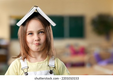 Cute Adorable Toddler Smiling Happy Stand Holding Book Over Head