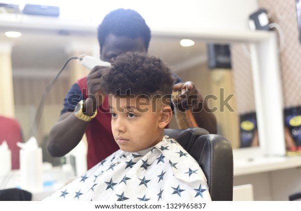 Cute African American Boy African Barbershop Stock Photo