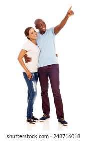 Cute African American Couple Pointing Empty Space