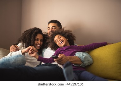 Cute african american family enjoying time together.