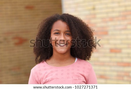 Similar – Cute African American girl smiling in the street with afro hair