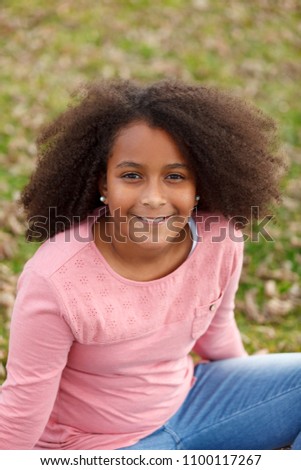 Similar – Cute African American girl smiling in the street with afro hair