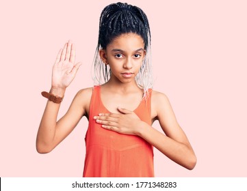 Cute african american girl wearing casual clothes swearing with hand on chest and open palm, making a loyalty promise oath 