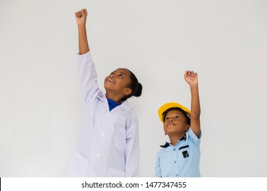 Cute African American Kids In White Lab Coat And Yellow Helmet Flying Up Isolated On White Background