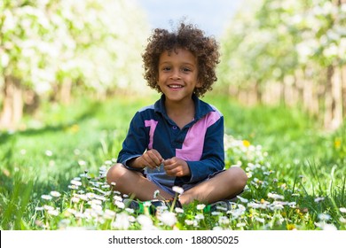 Cute African American Little Boy Playing Outdoor - Black People