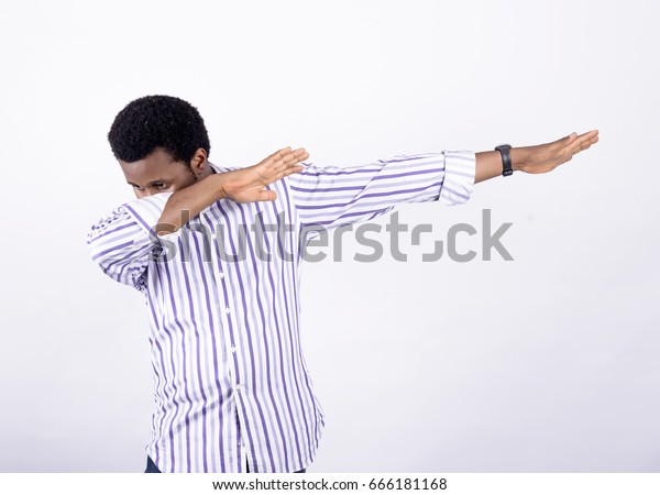 Cute African Guy Dabbing Stock Photo (Edit Now) 666181168