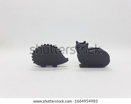 Cute Artistic Black Animal Shaped Plastic Stainless Steel Clip for Accessories in White Isolated background 