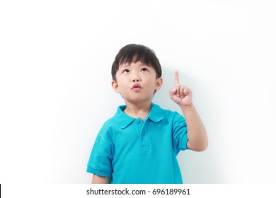 Cute Asian boy having a good idea - isolated over a white background