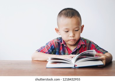 Seven Years Old Child Reading Book Stock Photo (Edit Now) 565994311