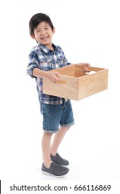 Cute Asian Child Holding Empty Wooden Box On White Background Isolated