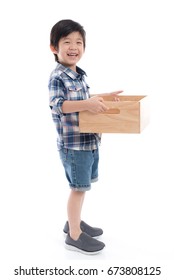 Cute Asian Child Holding Empty Wooden Box On White Background Isolated