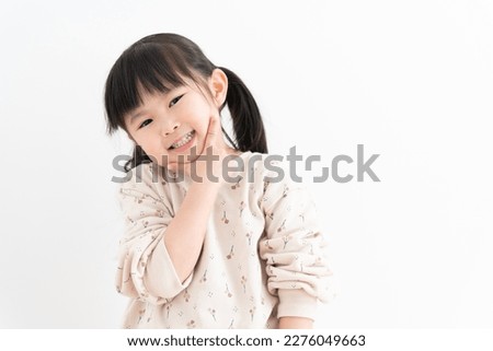 Cute Asian child on white background