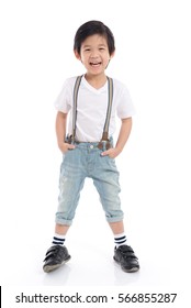 Cute Asian Child  In White T-shirt And Jeans Standing On White Background Isolated