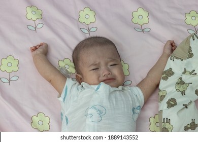 Cute Asian Chinese Baby Boy Waking Up And Stretching