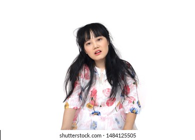 Cute Asian Girl Feeling Exhausted. isolated on White Background.