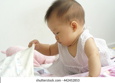 Cute Asian Infant Baby Finding Something Stock Photo 442452853 ...