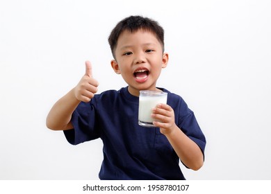 Cute Asian Kid Drinking Milk And Showing Thumb Up Gesture, Isolated On White Background 