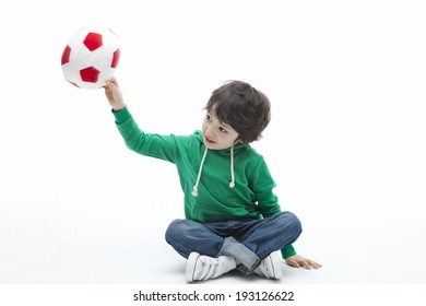 Cute Asian Kid Playing With Ball