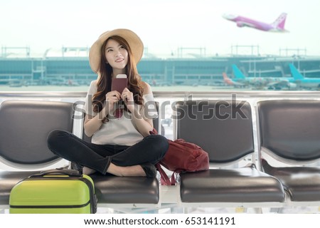 Similar – Image, Stock Photo Positive girl in plane near window