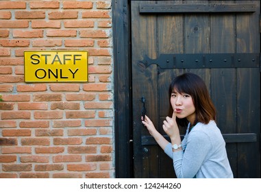 Cute Asian Thai Office Salary Employee Woman Is Trying To Enter The Room With Staff Only Label Sign, Which Is A Forbidden Restricted Area. Is It Illegal?