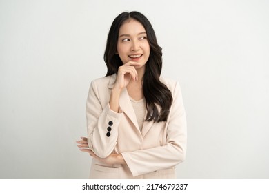 Cute Asian Woman In Color Casual Dress Thinking And Imagination Isolated On Pink Background