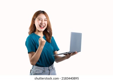 Cute Asian Woman Holding A Laptop Computer, Raising Her Hand To Smirk, Isolated On White Background.