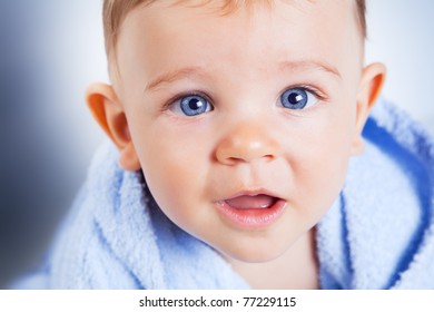 Cute Baby Boy With Big Blue Eyes