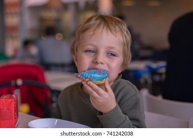 Cute Baby Boy Eating Sweet Donut Stock Photo 741242038 | Shutterstock